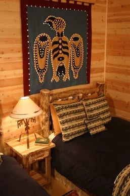 Bedroom with first nations art.