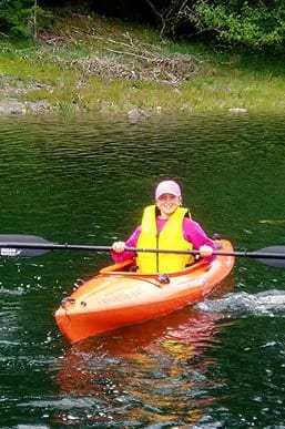 Person kayaking in Alaska.