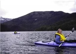 Woman kayaking.