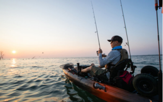 An avid angler tries his hand at kayak fishing at Favorite Bay Lodge.